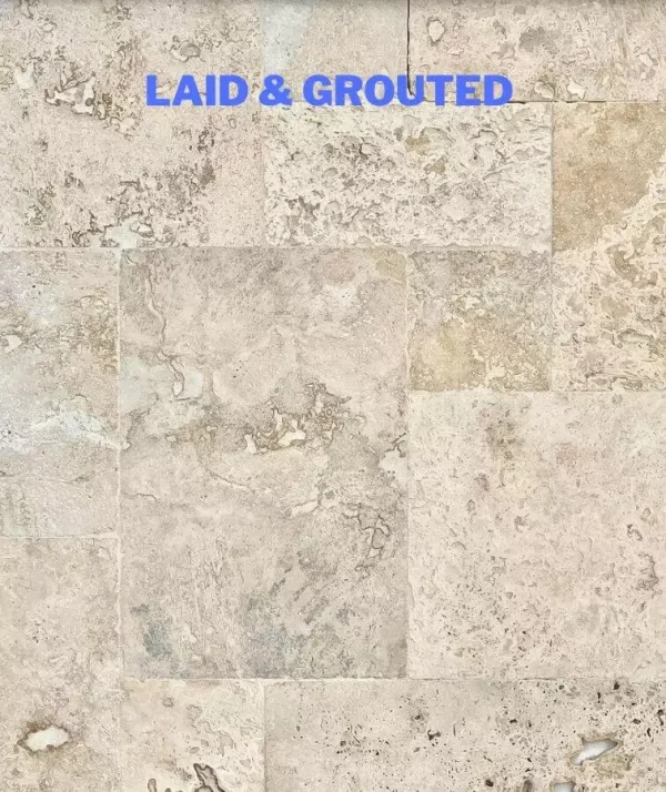 Laid grouted rustica ivory travertine tiles