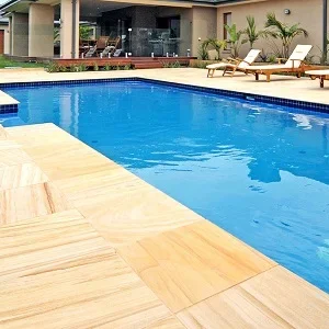 Teakwood sandstone pavers and tiles yellow tiles ochre tiles pool pavers and pool coping