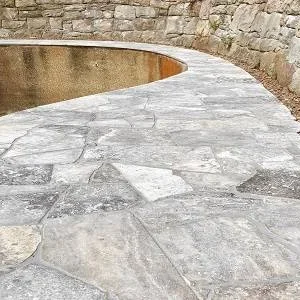 Travertine crazy paving silver pool