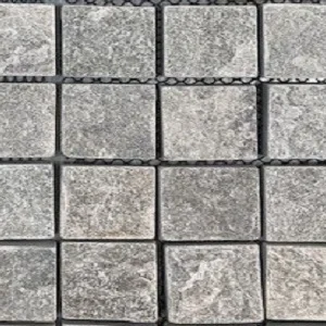 Tumbled grey cobblestones tiles and pavers